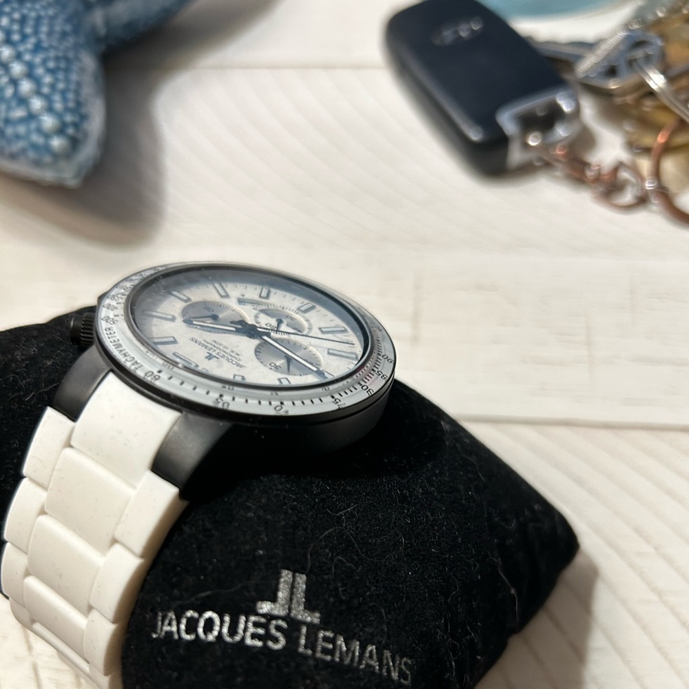 Sharp watch. White never worn. Needs a new battery.